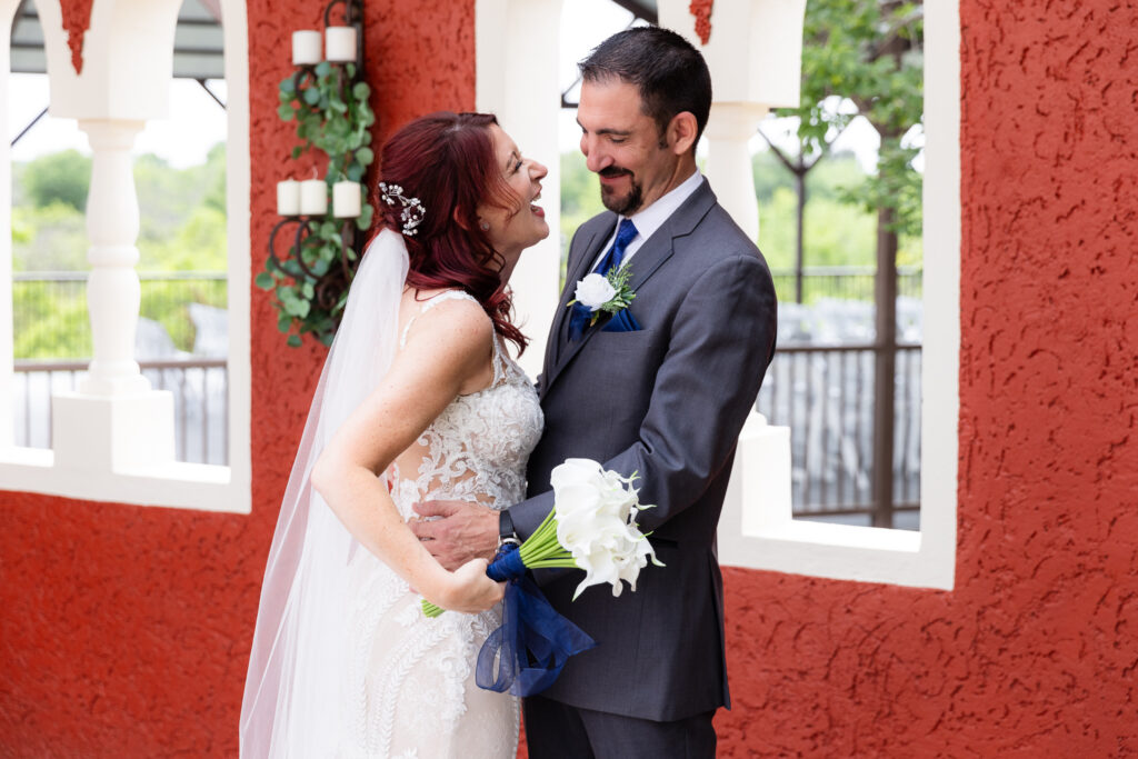 Bride laughing at groom