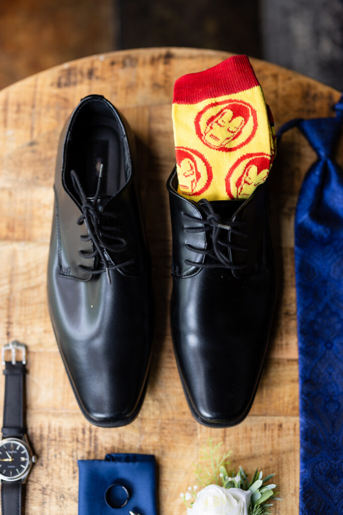 Black wedding shoes with yellow and red iron man socks