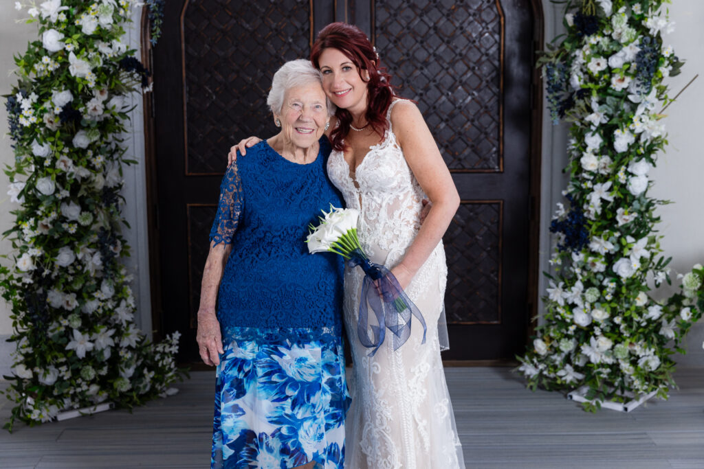 Bride hugging grandma smiling