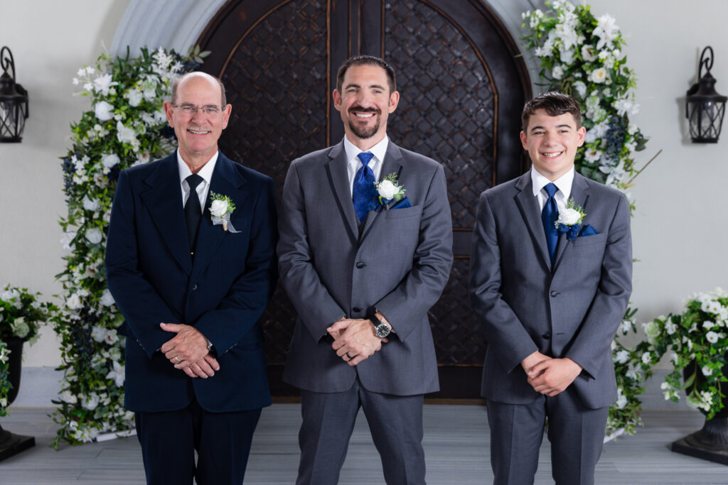 Groom, dad and son generational photo smiling