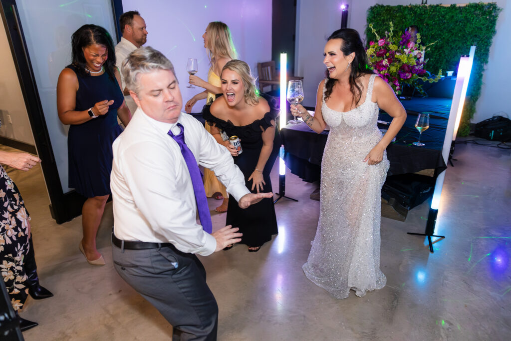 bride and friends dancing on dance floor at Prosper Wine House